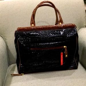 Beautiful Samantha Brown black and camel dowel travel bag. Like new condition.